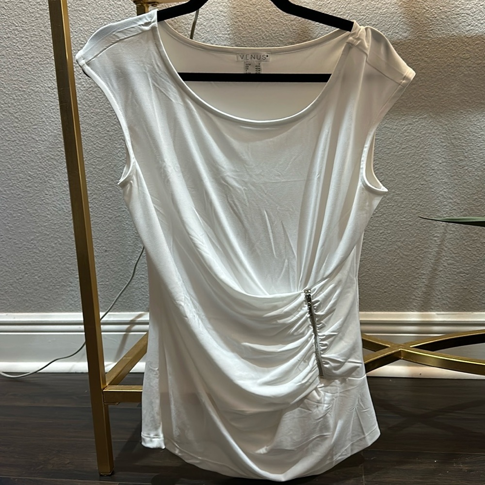 Venus top with side zipper. Never worn Large